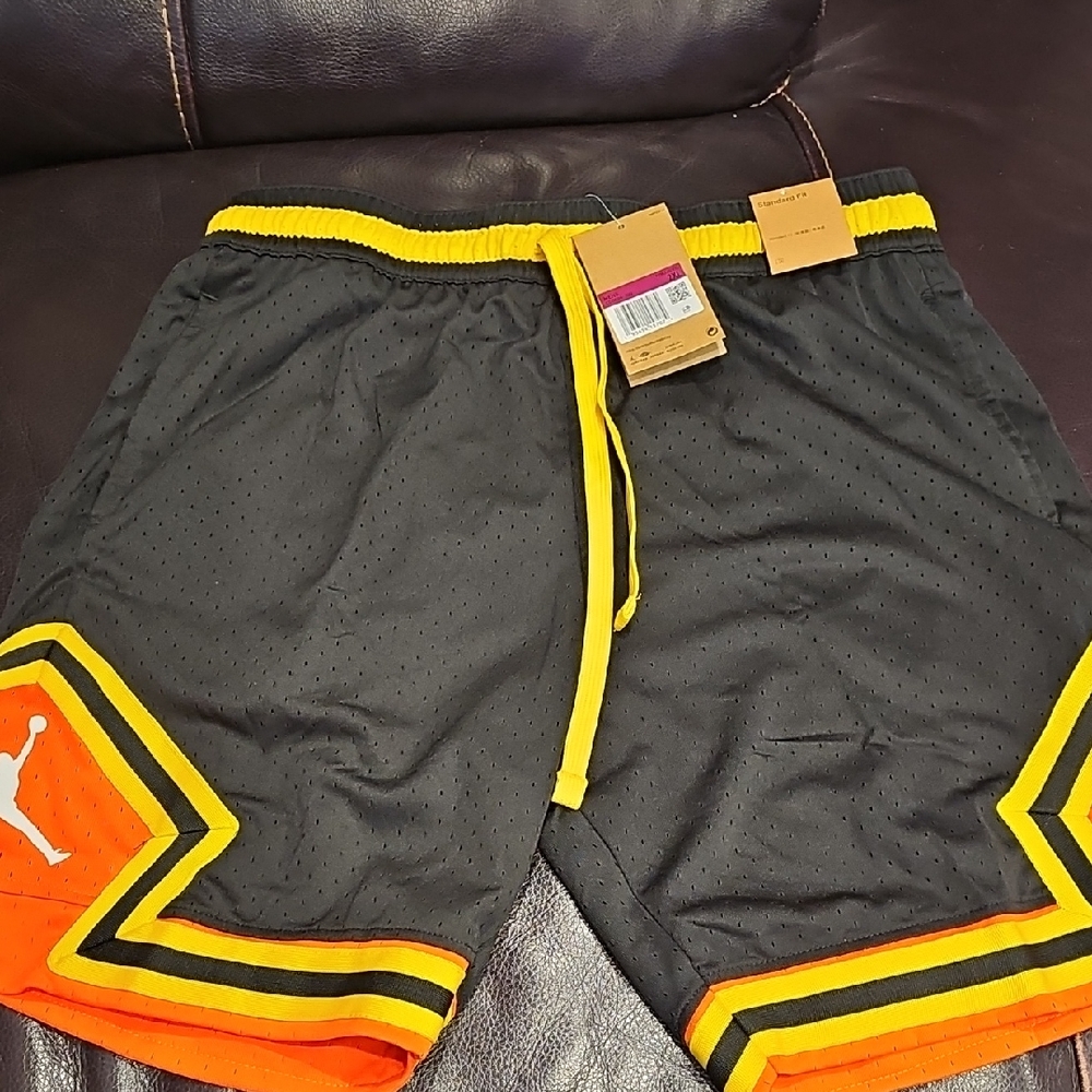 Puma Black Shorts with Orange and Yellow Trim